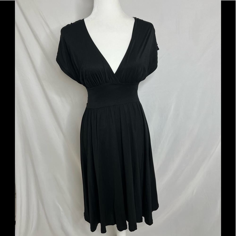 Ted Baker Black dress size 1 equal to a 4 in US.